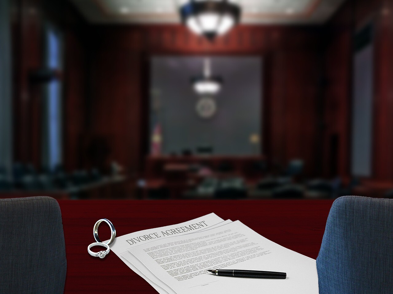 photo of divorce agreement on a courtroom table